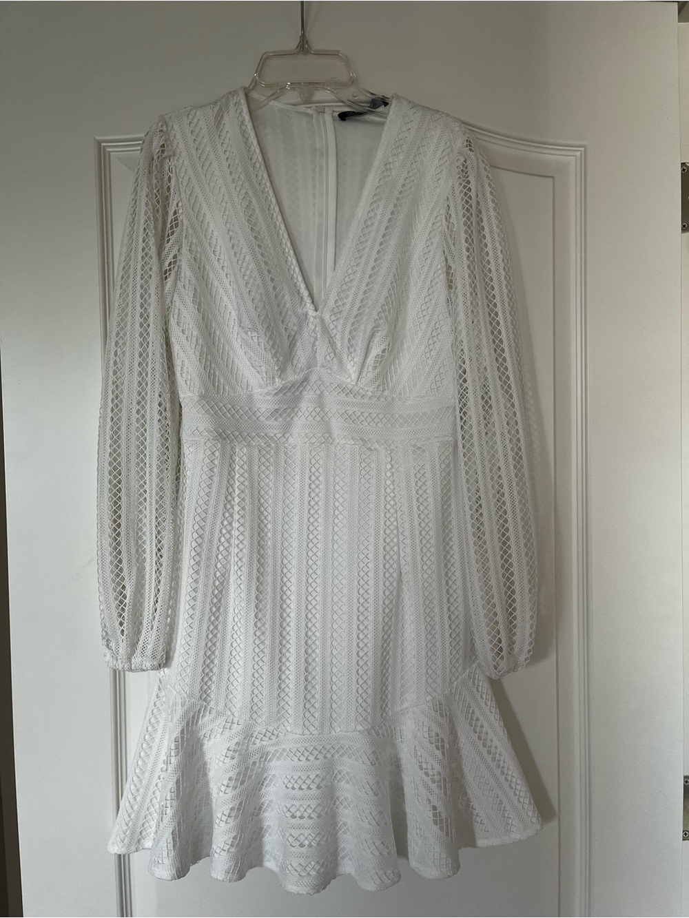 Simplee Apparel White Lace V-Neck Long Sleeve Ruffle Hem Dress